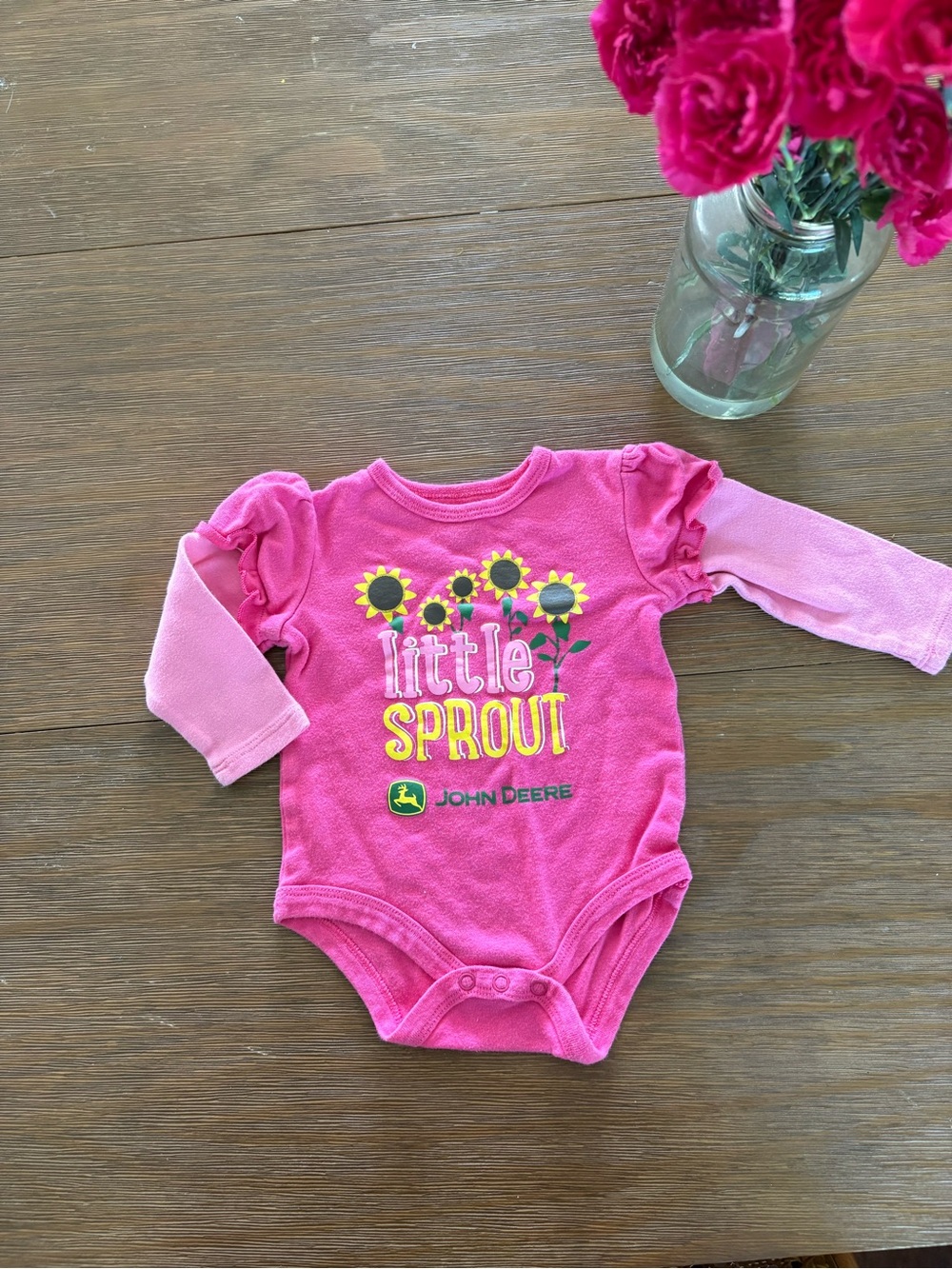 John Deere Pink Long-Sleeve Baby One-Piece with Sunflower Graphic